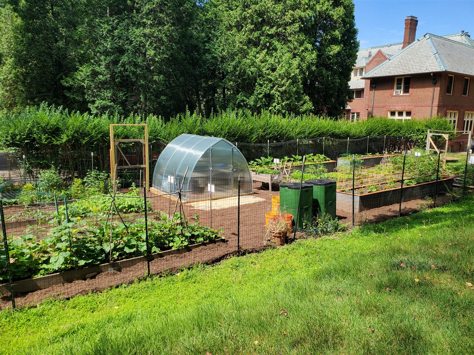 The Garden of Hope - raised beds, greenhouse, and compost bins at St. Marguerite's Retreat House